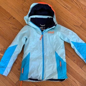 Helly Hanson, turquoise and light blue with orange accents